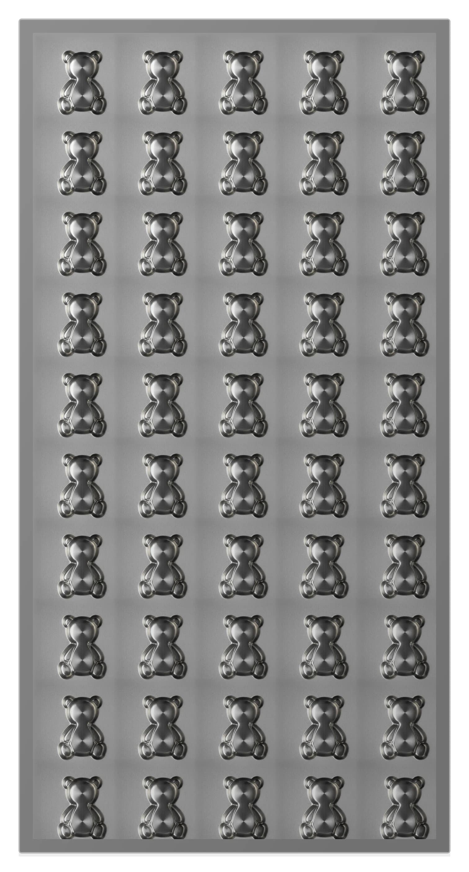 Brushed stainless steel plate with fifty bear-shaped cavities machined into its face, five across and ten rows down